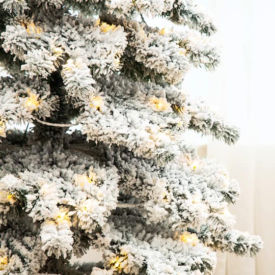 9ft. Pre-Lit Flocked Layered Spruce Artificial Christmas Tree, Warm White LED Lights
